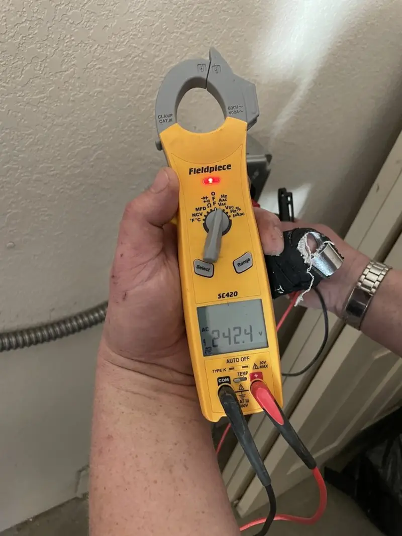 Voltage testing with clamp meter during Generator Installation in Hegins